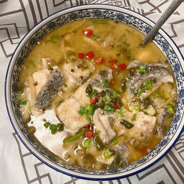 Whole Fish with Clear Noodle in Szechuan Pickle Soup 酸菜活鱼.