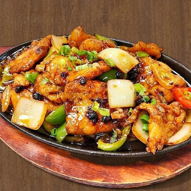 Sizzling Fish Fillet with Black Bean & Chili Pepper 铁板豆豉鱼片.